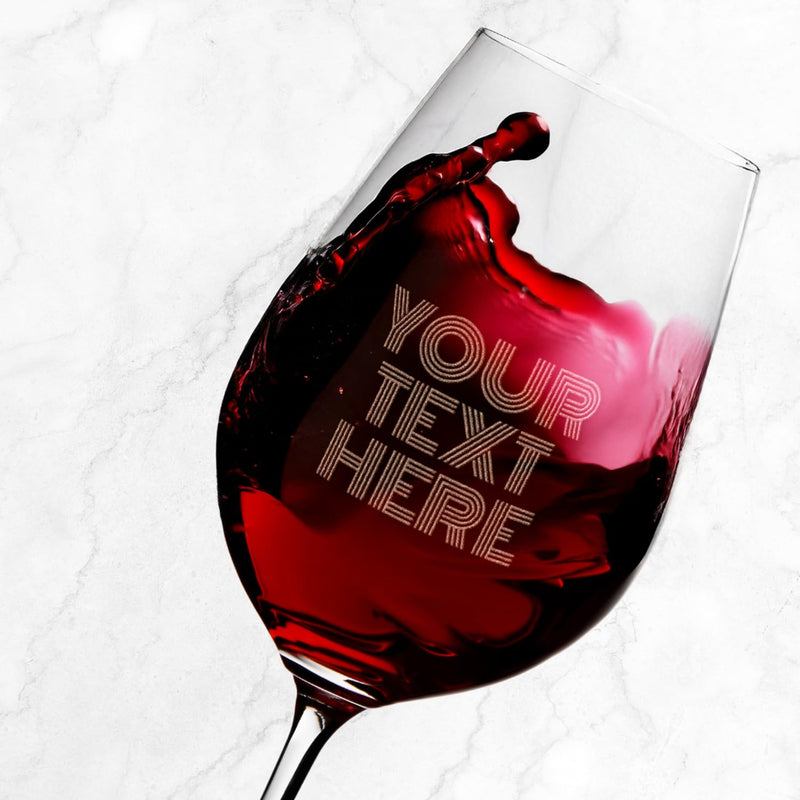 Wine glass with red wine and 'Your Text Here' text on a white background