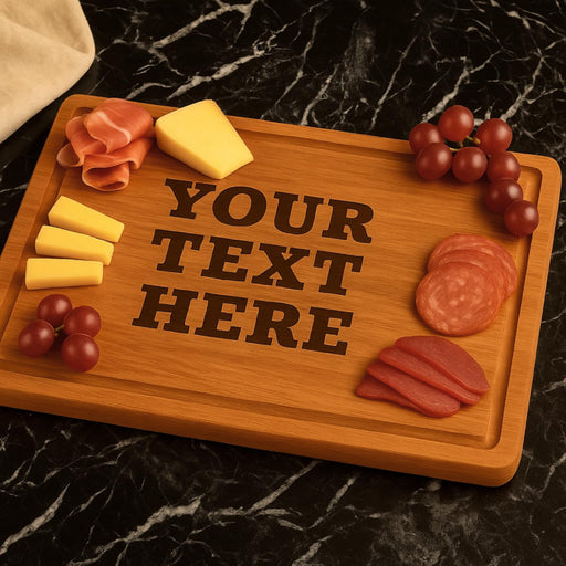 Wooden cutting board with text 'YOUR TEXT HERE' surrounded by cheese, salami, and grapes on a dark marble surface.