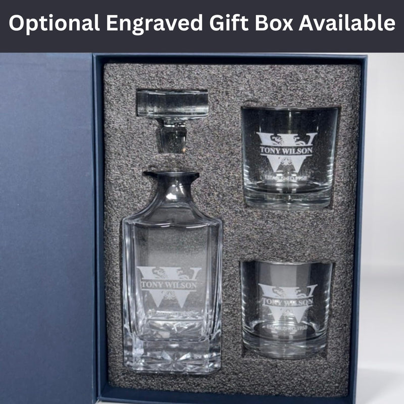 Glass decanter and two glasses with engraved text in a box, labeled 'Optional Engraved Gift Box Available'.