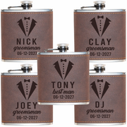 Set of five personalized leather flasks with tuxedo design and names engraved.
