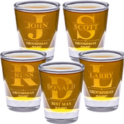 Five shot glasses with engraved names and roles on a white background