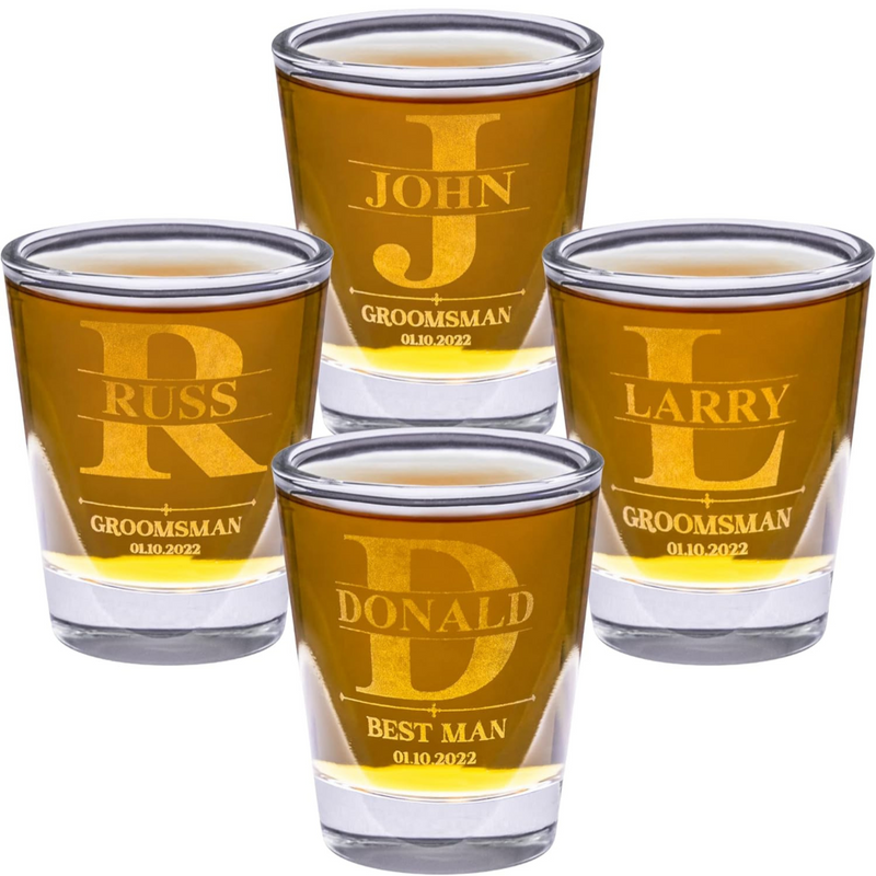 Set of personalized shot glasses with names and roles engraved on a white background