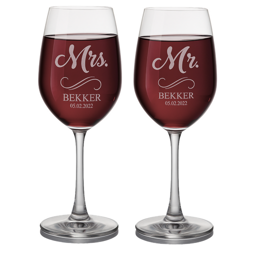 Two wine glasses with 'Mr.' and 'Mrs.' engraved names on a white background