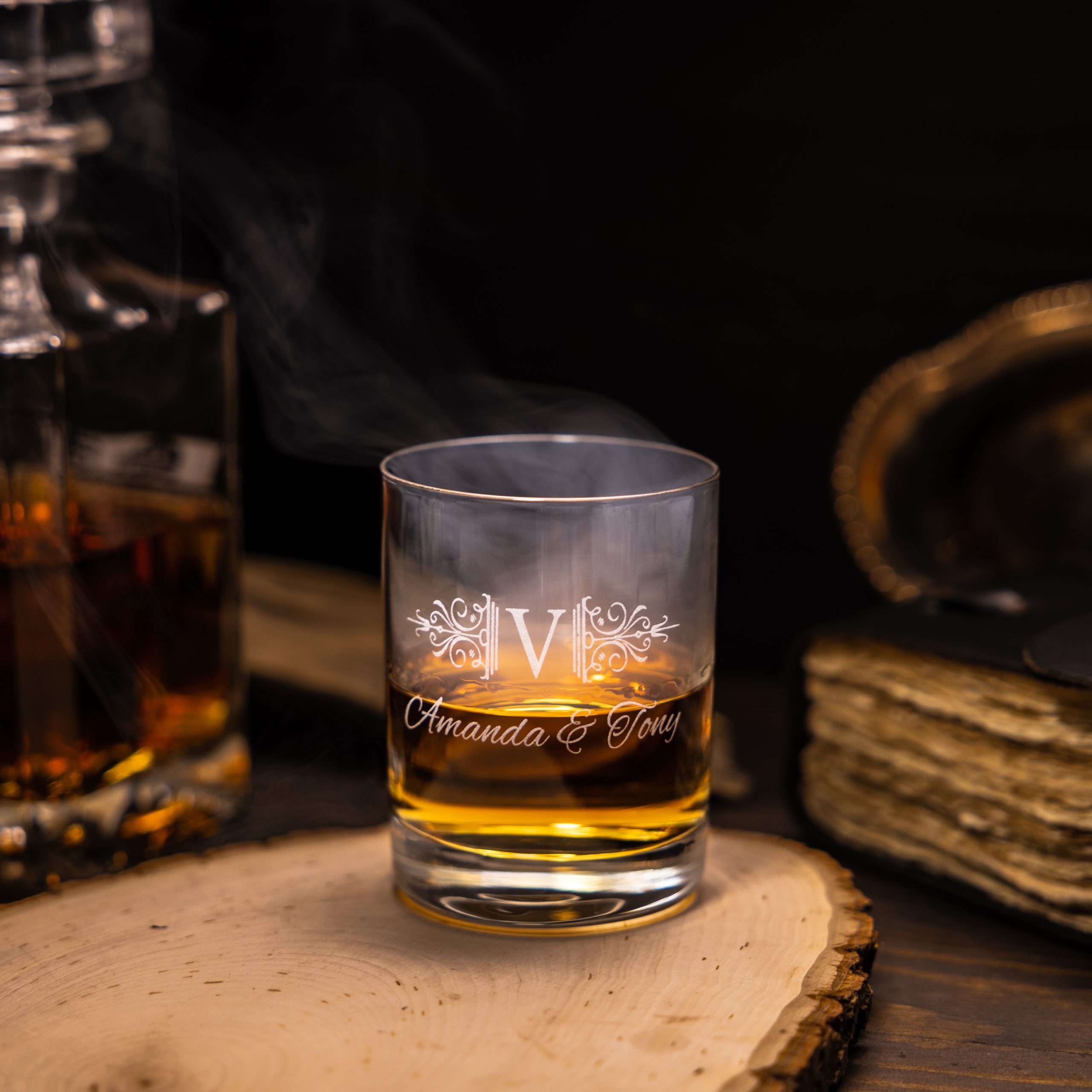 https://giftsinscribed.com/wp-content/uploads/Engraved-whiskey-glass-with-liquor-scaled.jpg